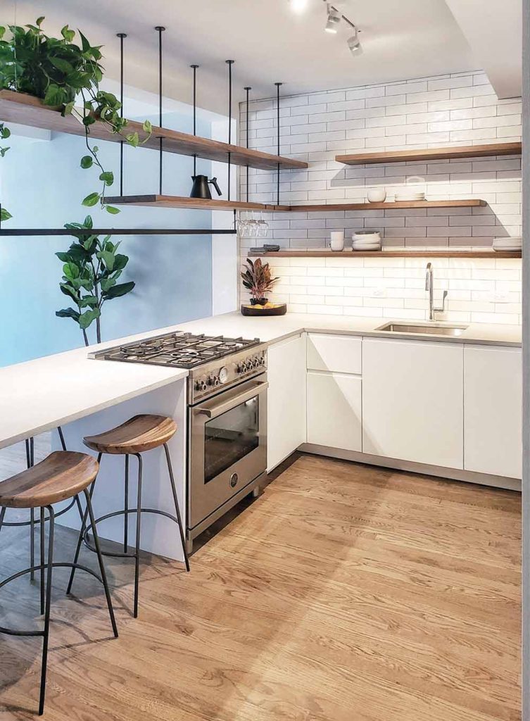 A kitchen with open shelving.